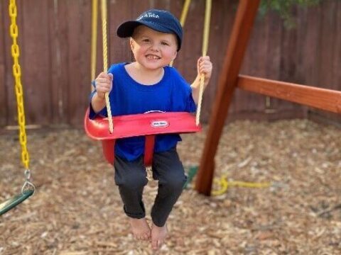 Toddler On A Swing